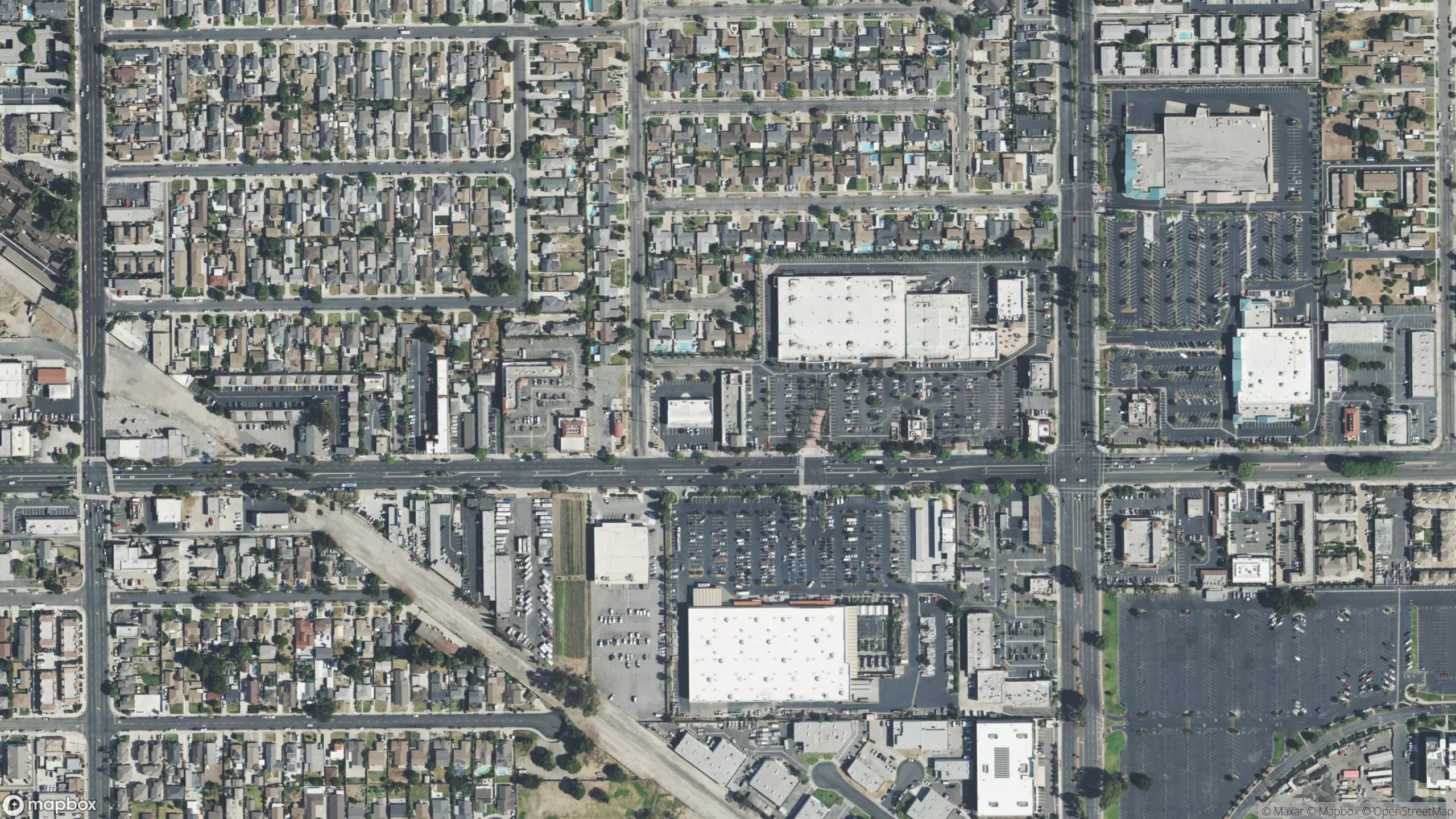 Aerial of the Lincoln Ave and Valley View St trade area with the property, Buena Park Marketplace, and Cypress College marked